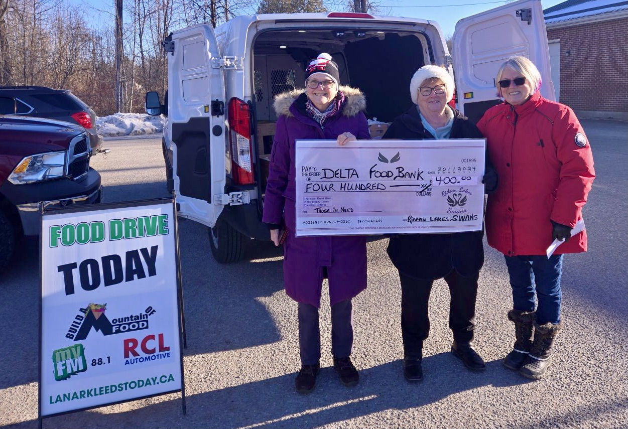 Rideau Lakes Swans present cheque to BAM of Food campaign.