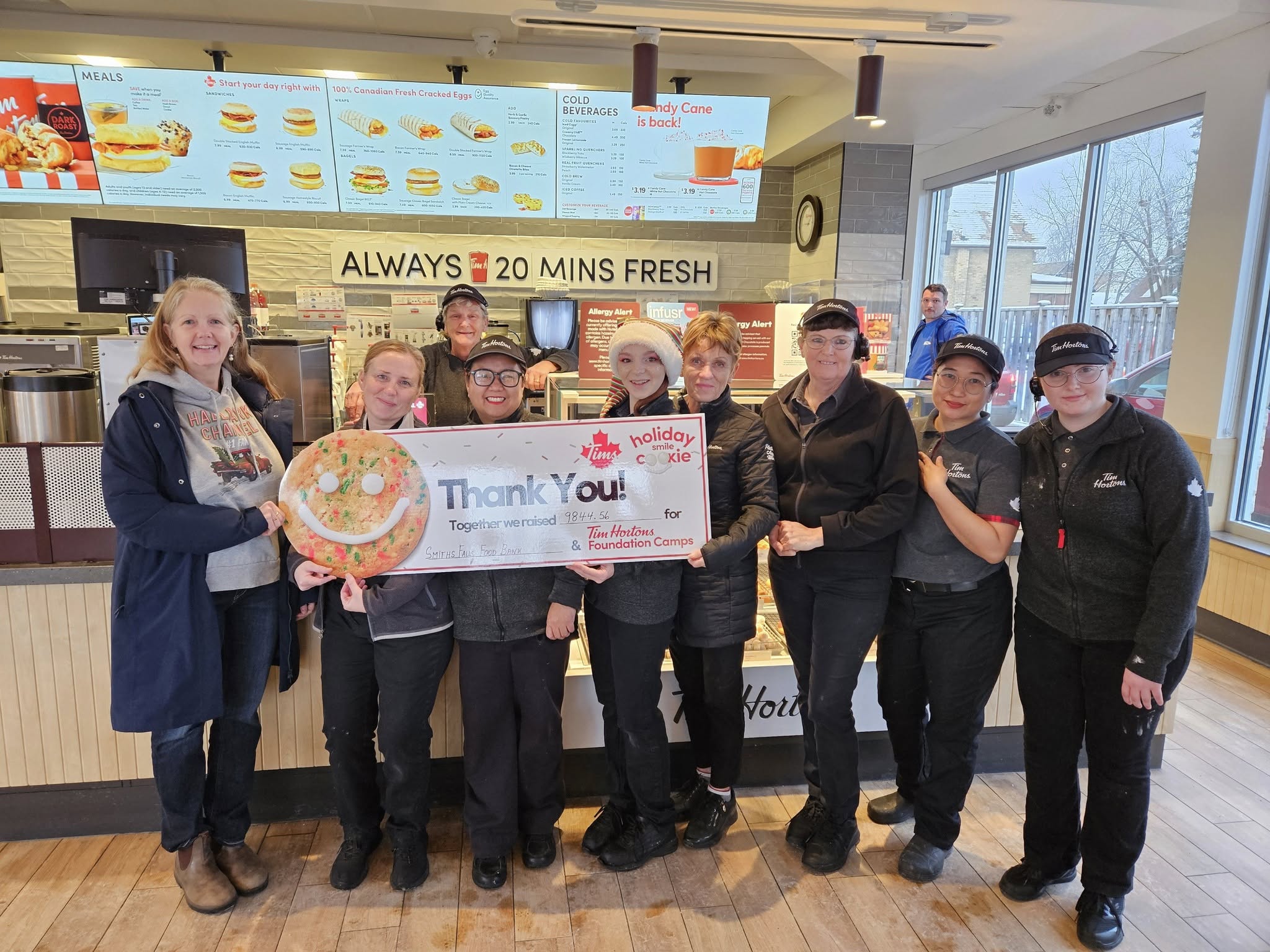 Tim Hortons staff present cheque to BAM of Food campaign.